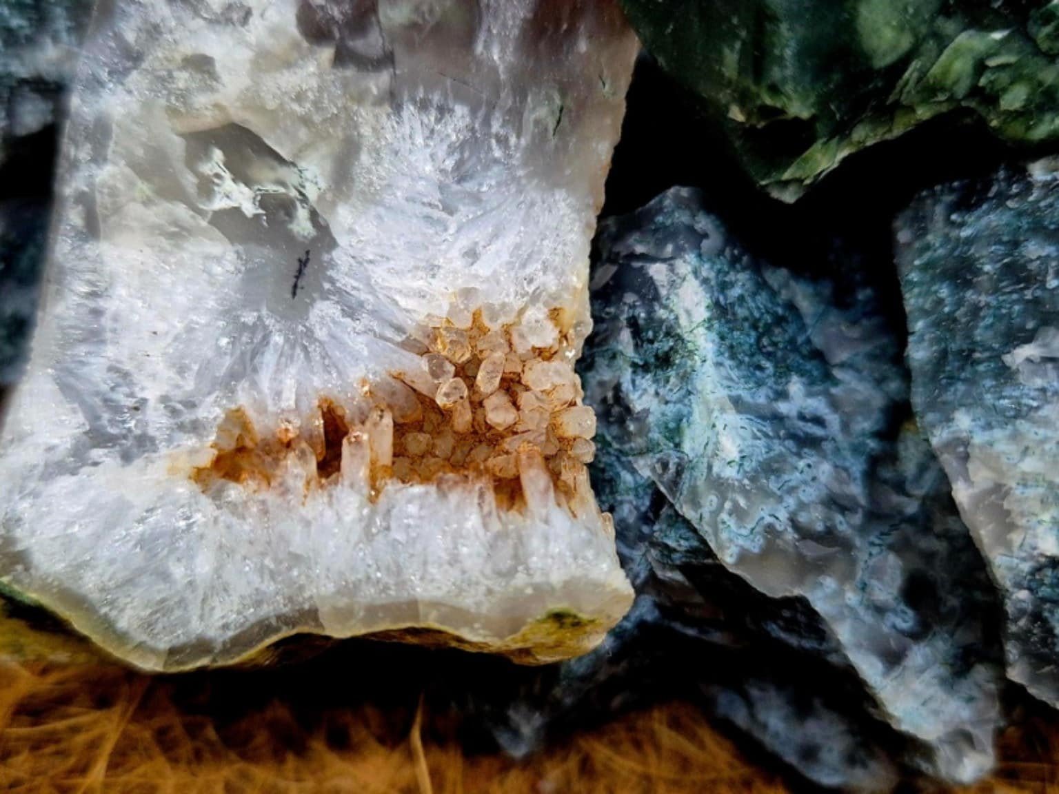 Close-up of raw Moss Agate crystal with natural green and white patterning